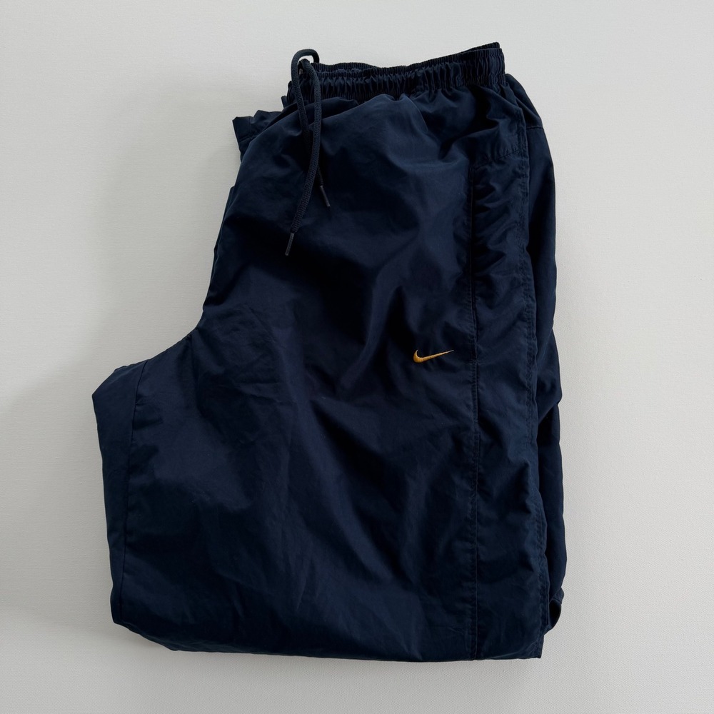 Nike Mens XXL Navy Blue Windbreaker Track Pants Gold Swoosh Zip Ankle Y2K Lined